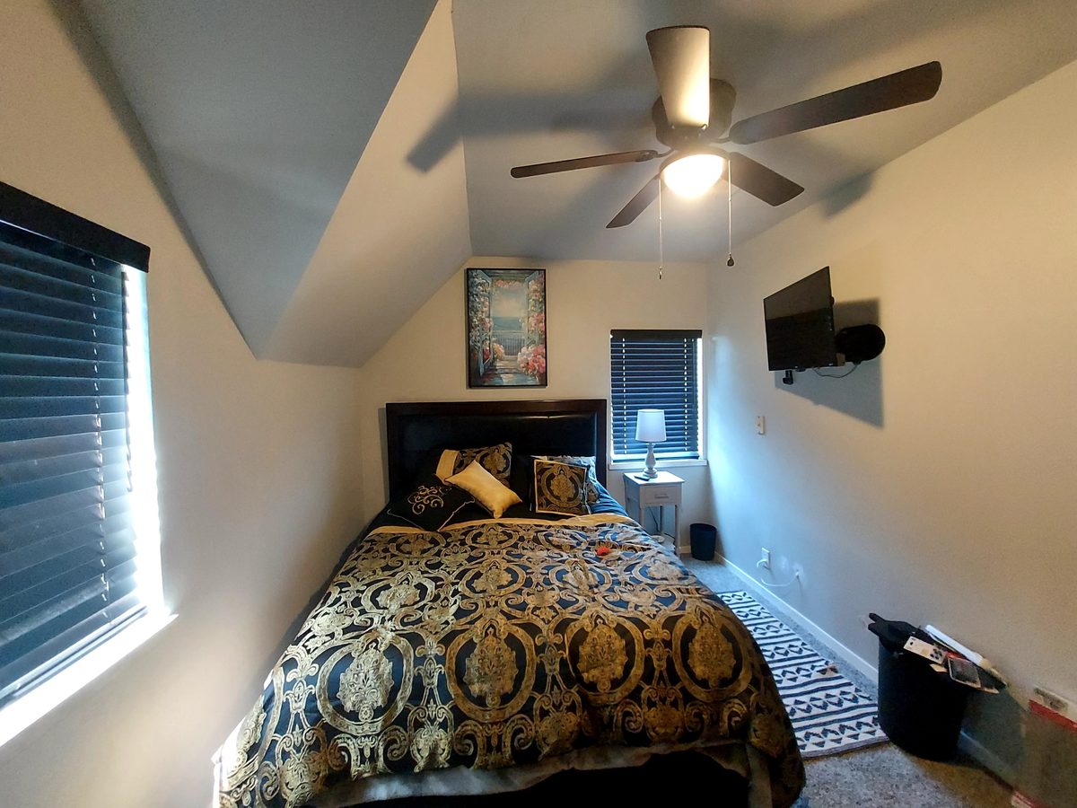 Upstairs bedroom with vaulted ceiling