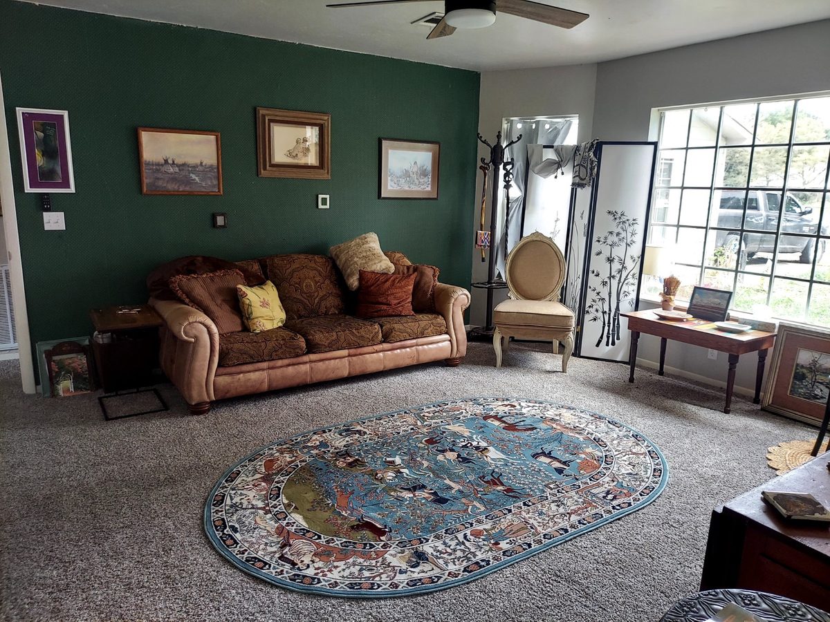 Living room with green accent wall